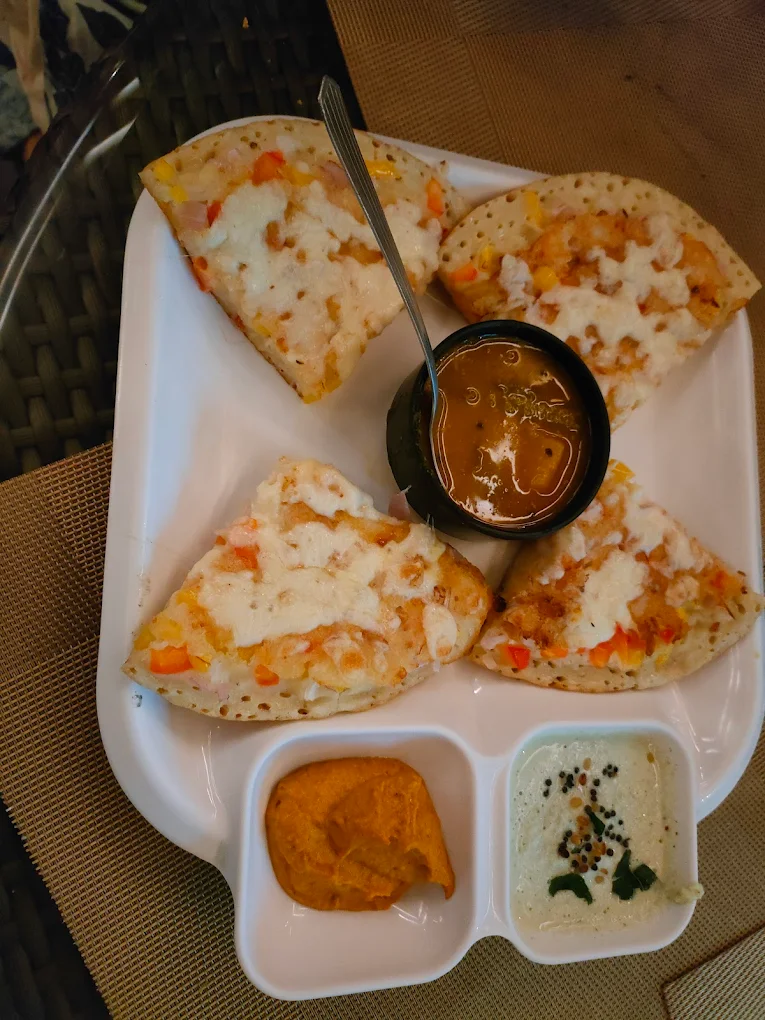 Uttapam with chutney & sambar